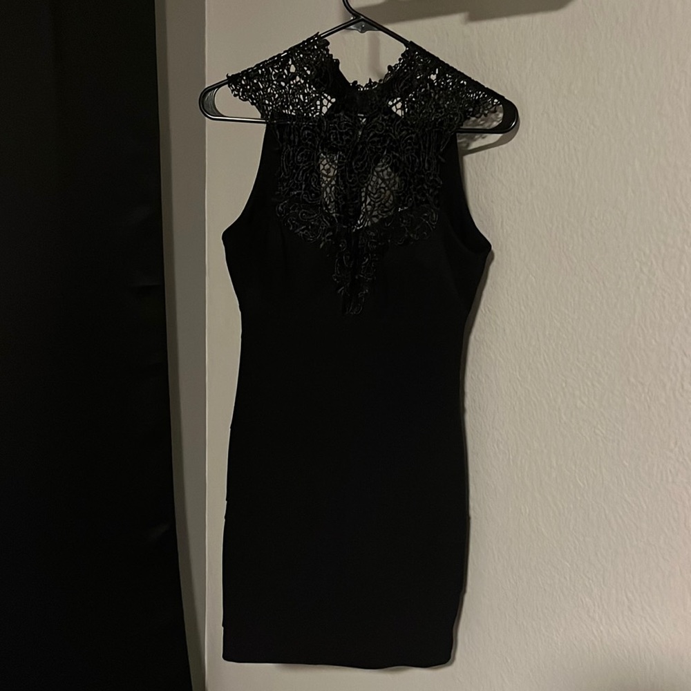 Black, sleek, mini dress. Classic. Little black dress.